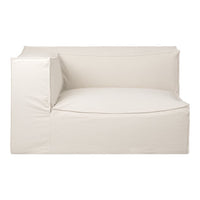 Cream-colored sofa with a minimal design and soft fabric texture. Ideal for modern decor settings.