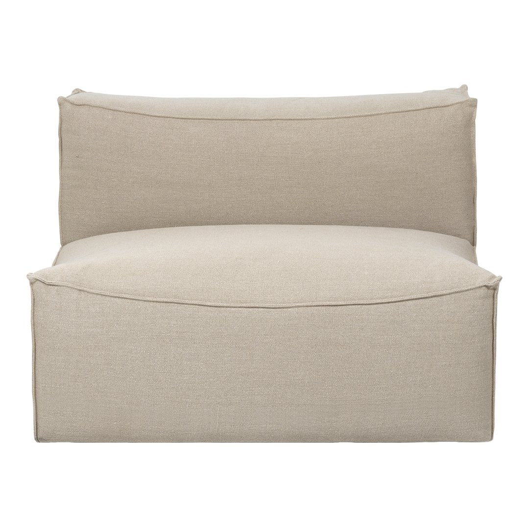 Beige upholstered chair with a smooth, minimalist design and subtle texture, perfect for modern decor.