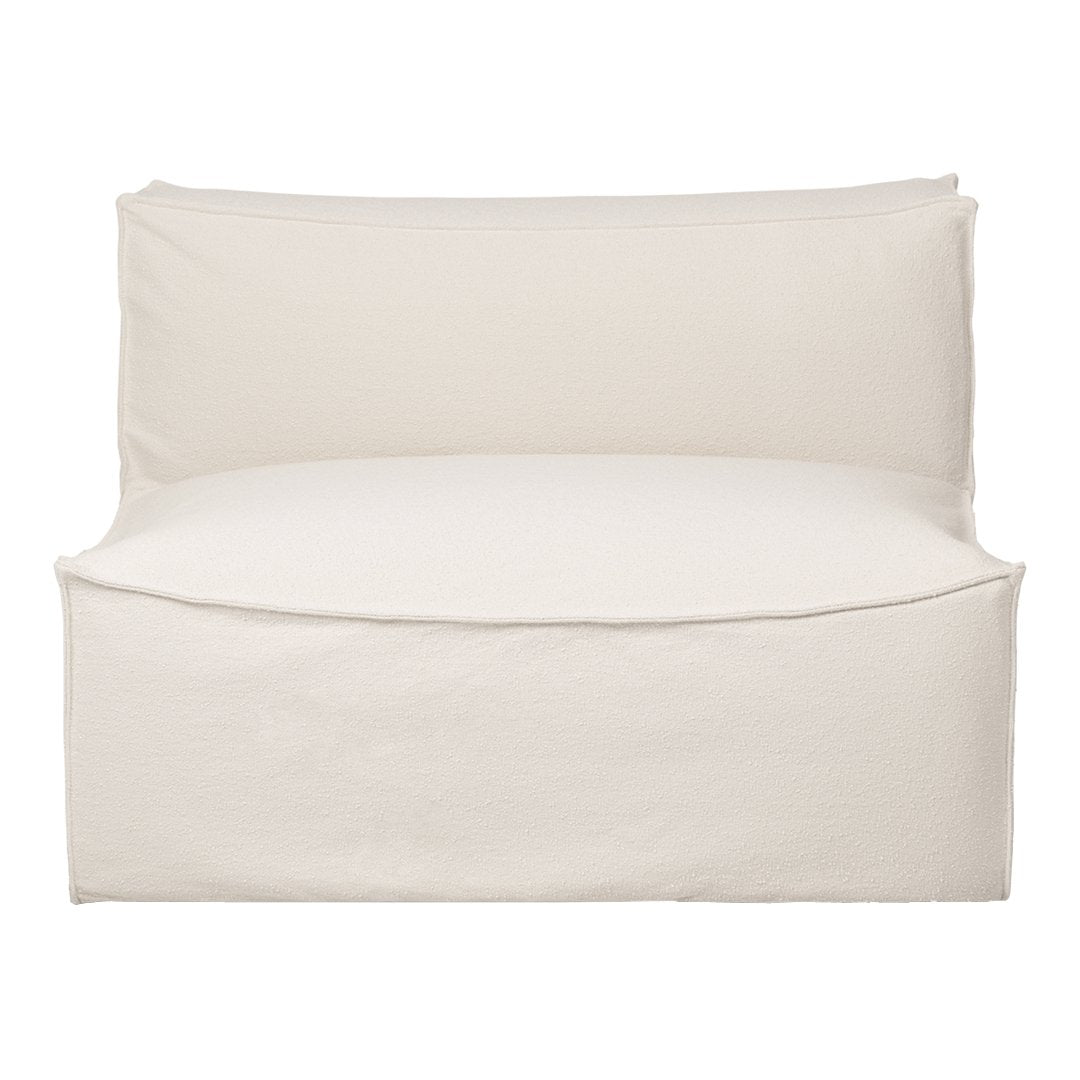 Cream-colored lounge chair with a smooth, minimalist design. Perfect for adding neutral tones to any space.