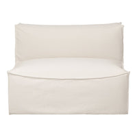 Cream-colored lounge chair with a smooth, minimalist design. Perfect for adding neutral tones to any space.