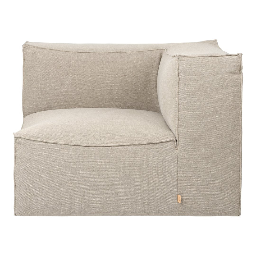 Beige corner sofa with a smooth, textured fabric and a minimalist design, perfect for modern decor.
