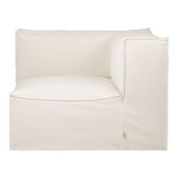 Cream-colored upholstered corner sofa with a minimalist design. Perfect for modern, neutral interiors.
