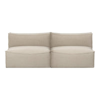 Beige modular sofa with smooth, solid fabric and simplistic, modern design for a cozy living space.