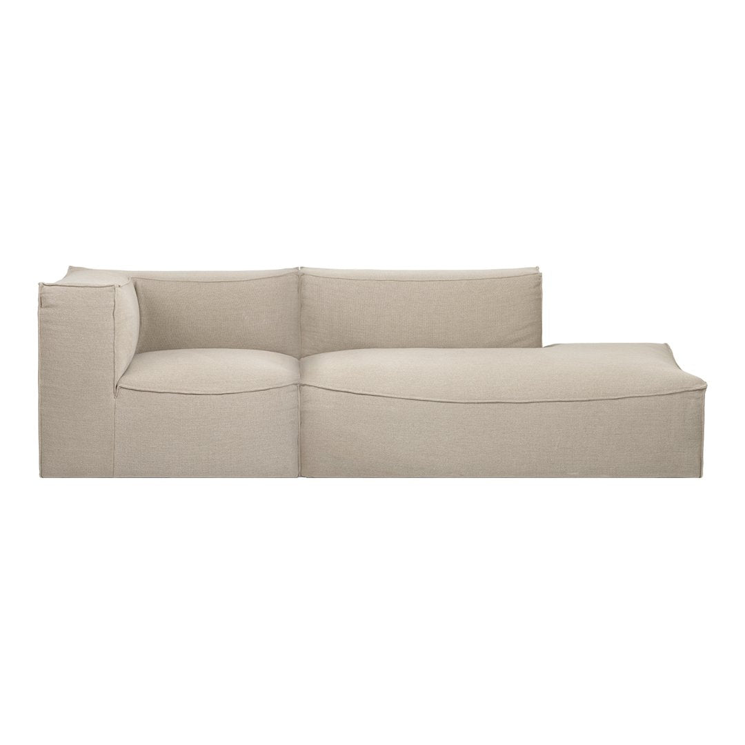 Beige sectional sofa with a modern, minimalist design and smooth texture, perfect for contemporary living spaces.