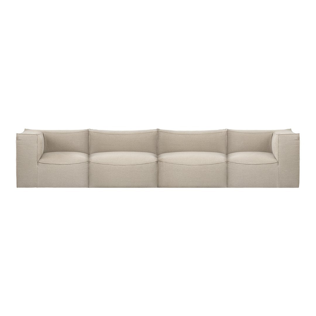 Beige modular sofa with a smooth, minimalist design and subtle, neutral tones for modern interiors.