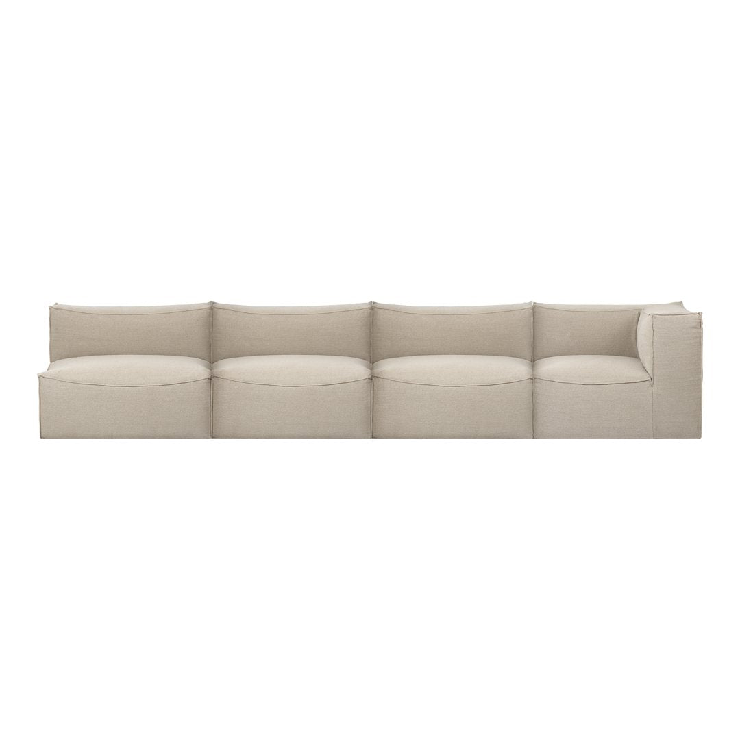 Beige sectional sofa with smooth, rounded cushions and a minimalist design. Perfect for modern living spaces.