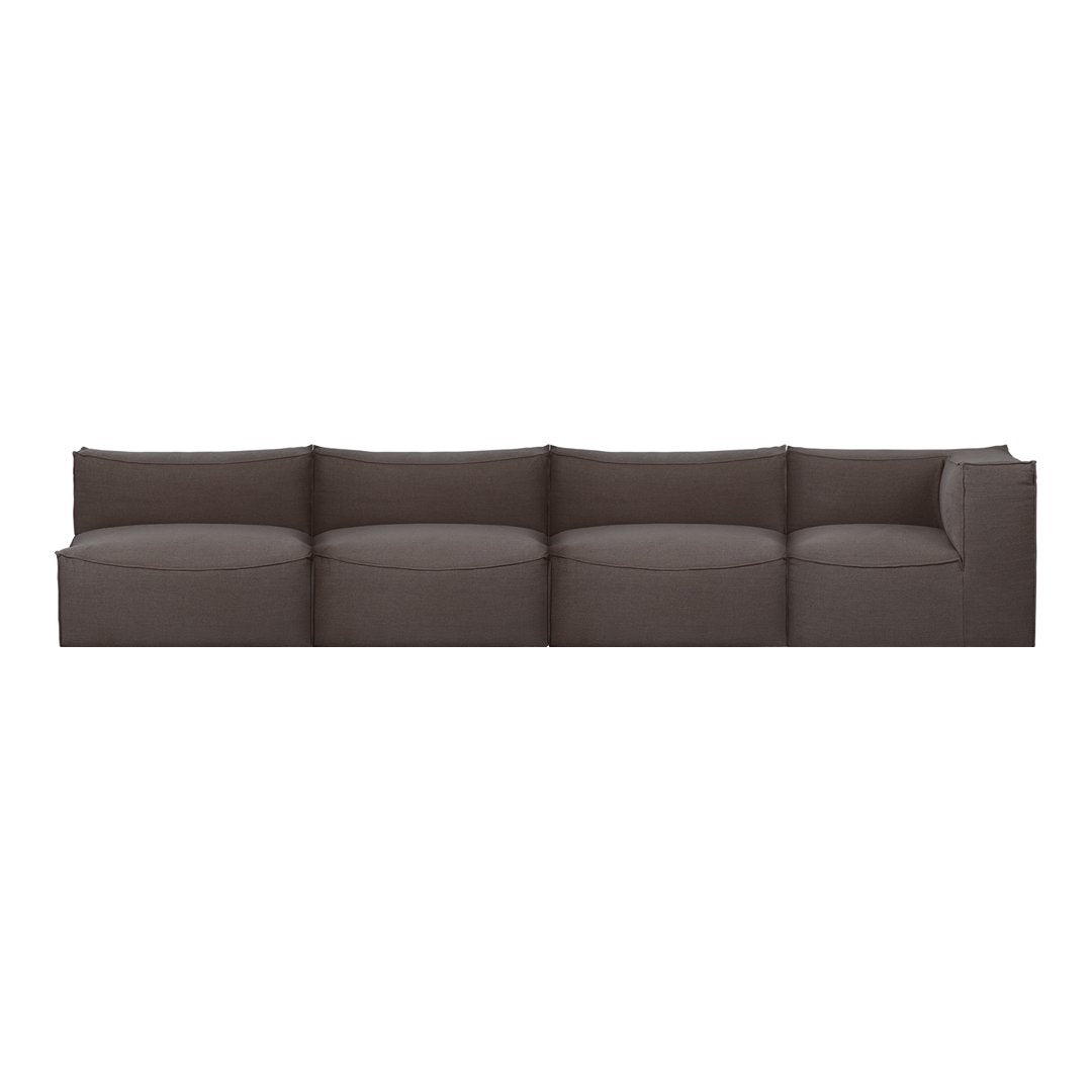 Modern modular sofa in a solid dark brown fabric with smooth, rounded cushions for a sleek, minimalist look.