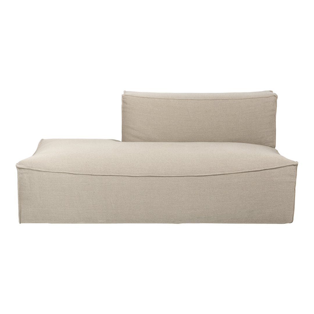 Beige chaise lounge with a smooth, minimalist design and soft, neutral fabric. Perfect for modern decor.