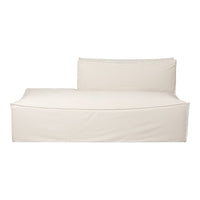 Light beige chaise lounge with a smooth, minimalist fabric design and clean lines, perfect for modern decor.