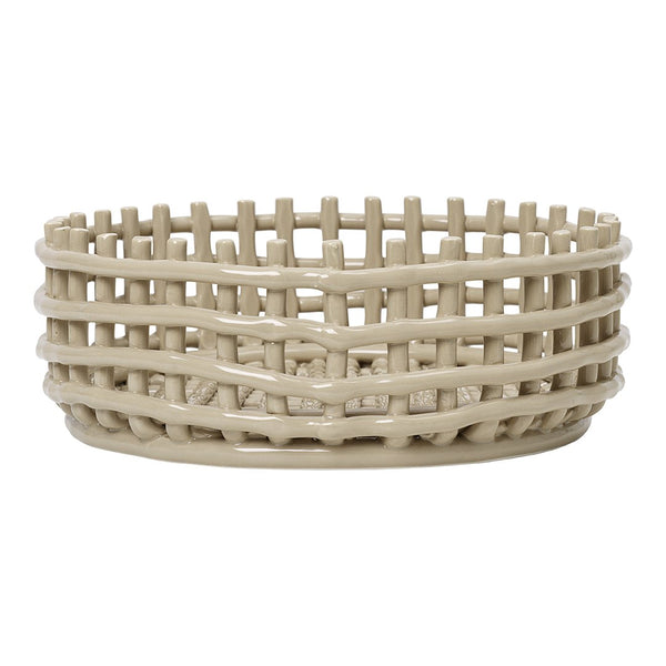 Beige woven basket with a textured, layered design and open pattern, perfect for storage and decor accents.