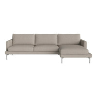 Light gray sectional sofa with a sleek, minimalist design and subtle textured fabric, perfect for modern living spaces.