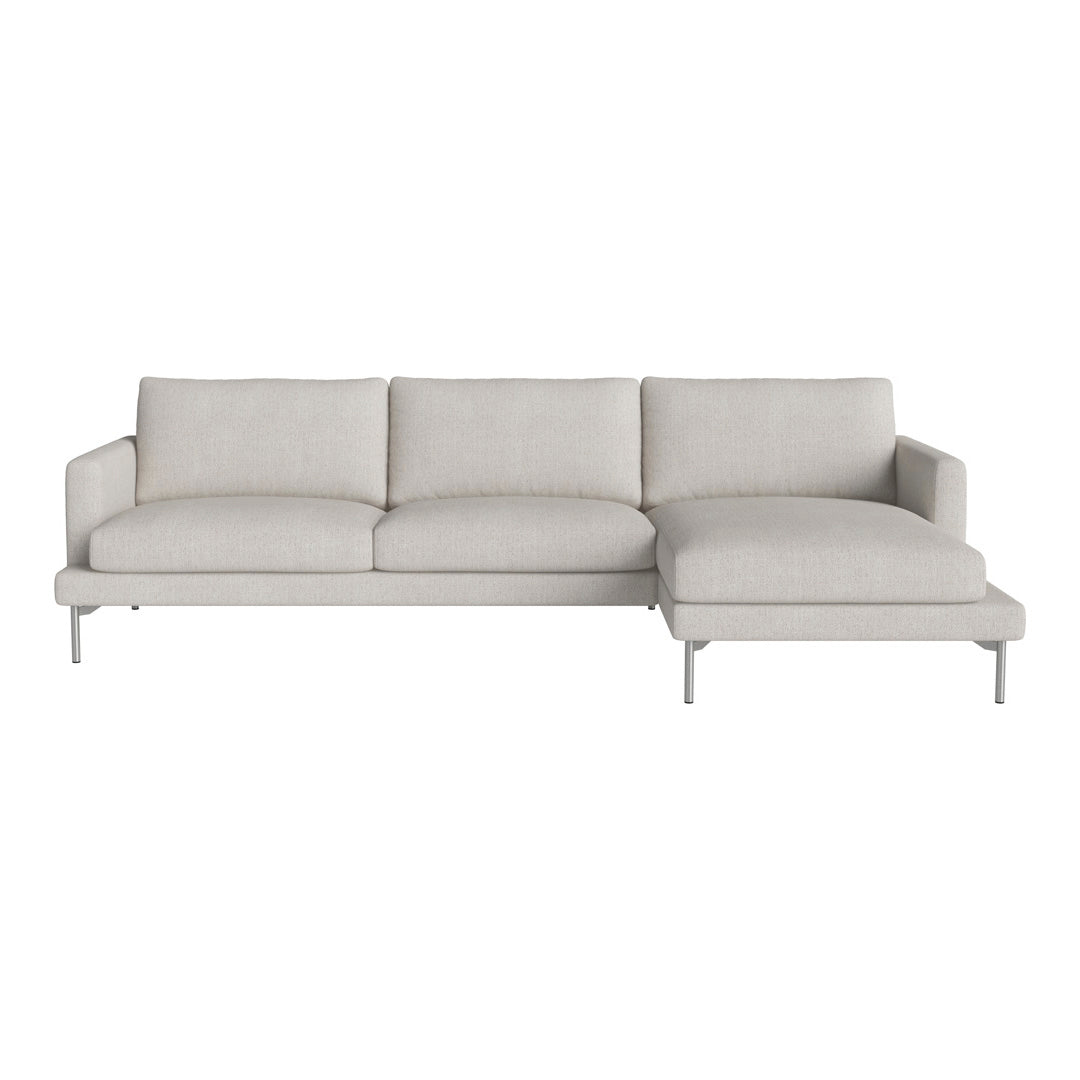 Light gray modern sectional sofa with clean lines and soft, textured fabric for a minimalist look.
