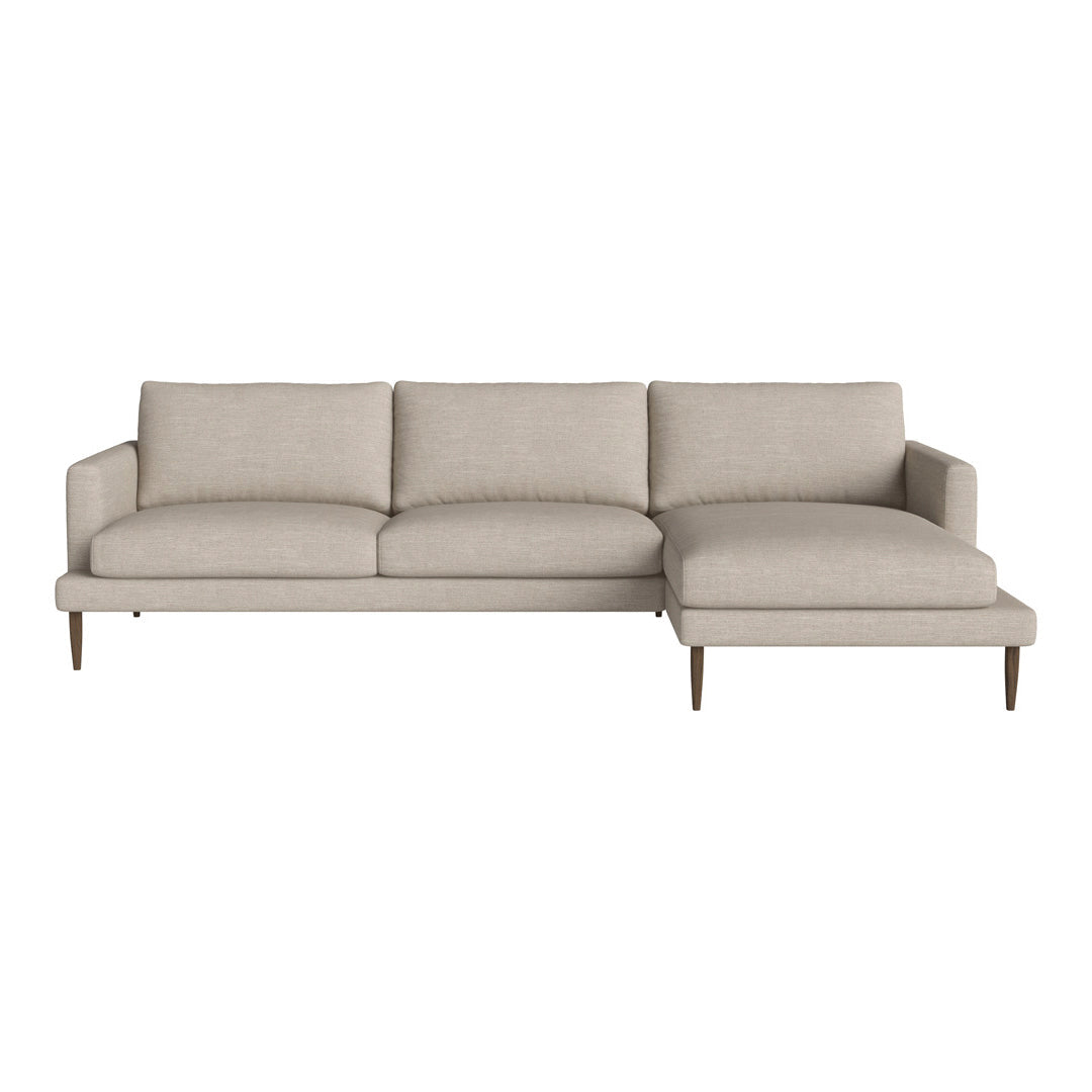 Light beige sectional sofa with a modern design and smooth fabric finish, featuring subtle texture and simple elegance.