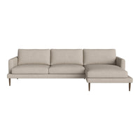Light beige sectional sofa with a modern design and smooth fabric finish, featuring subtle texture and simple elegance.