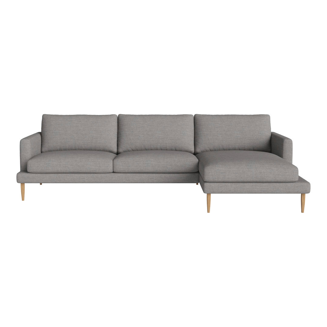 Gray sectional sofa with a sleek design and light wooden legs, featuring a smooth, solid fabric upholstery.