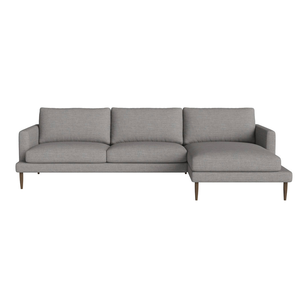 Modern gray sectional sofa with sleek lines and a simple design, perfect for any contemporary living space.