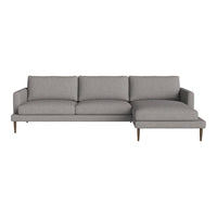 Modern gray sectional sofa with sleek lines and a simple design, perfect for any contemporary living space.