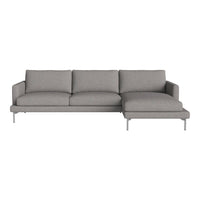 Gray sectional sofa with a sleek design, featuring a smooth fabric texture and minimalistic silver legs.