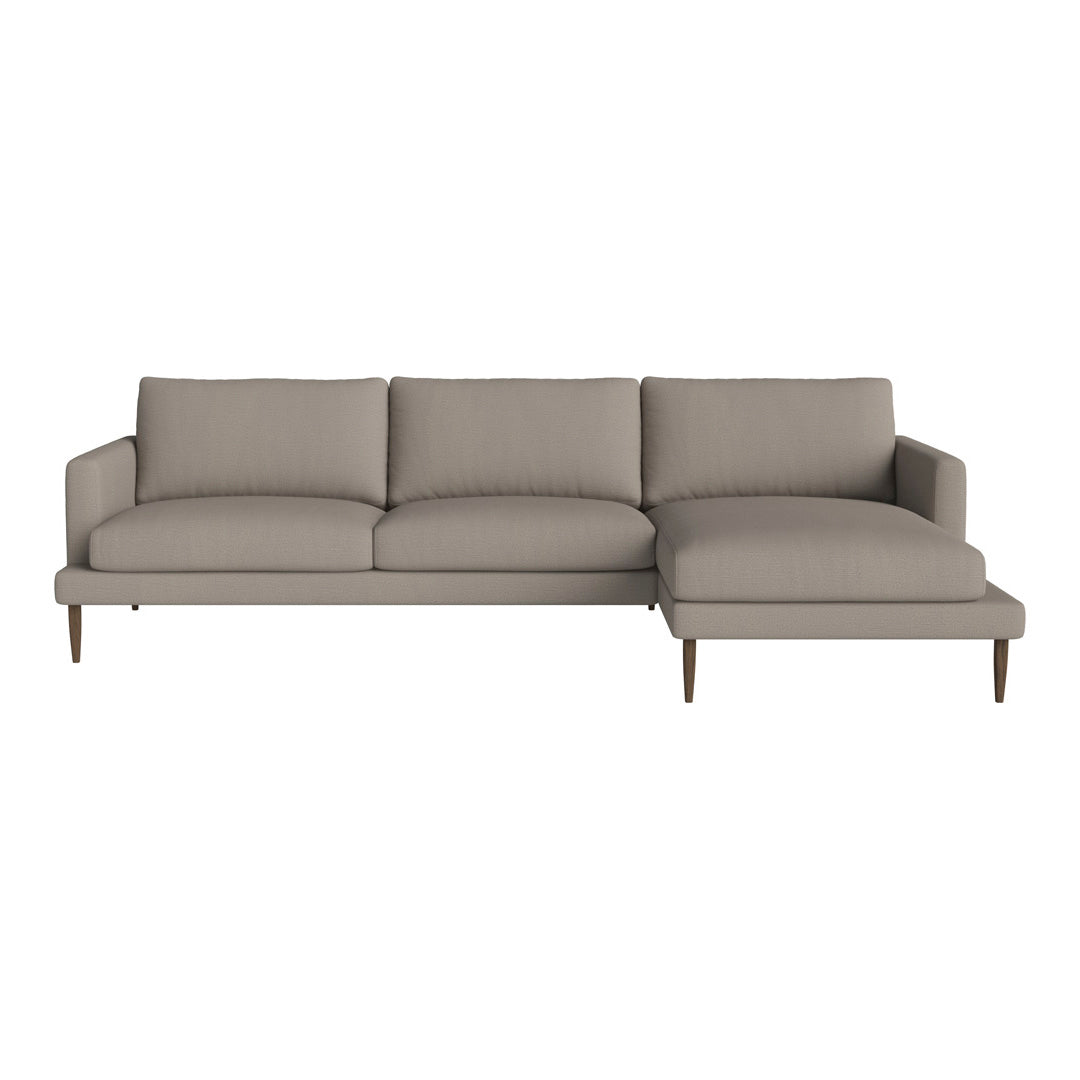 Light taupe sectional sofa with clean lines and smooth fabric, complemented by wooden legs for a modern touch.