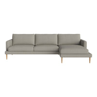 Light gray upholstered sofa with a smooth texture and minimalist design, featuring clean lines and wooden legs.