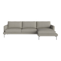 Light gray modern sectional sofa with a smooth, textured fabric. Clean lines and minimalist design.