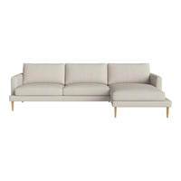 Light beige sectional sofa with clean lines and simple, modern design. Perfect for any contemporary living space.