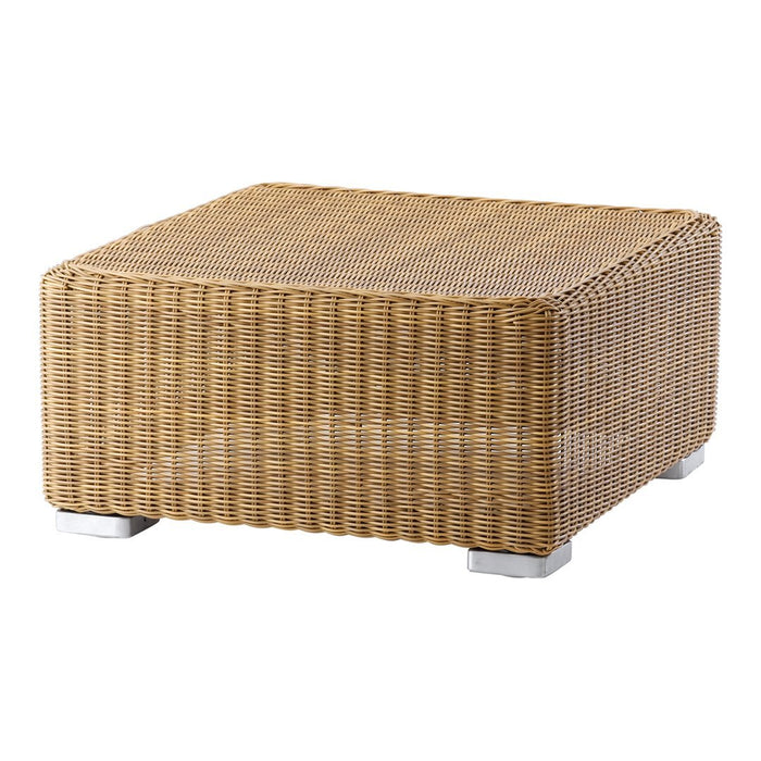 Square wicker coffee table in natural beige tones with textured pattern and white feet. Ideal for outdoor or indoor use.