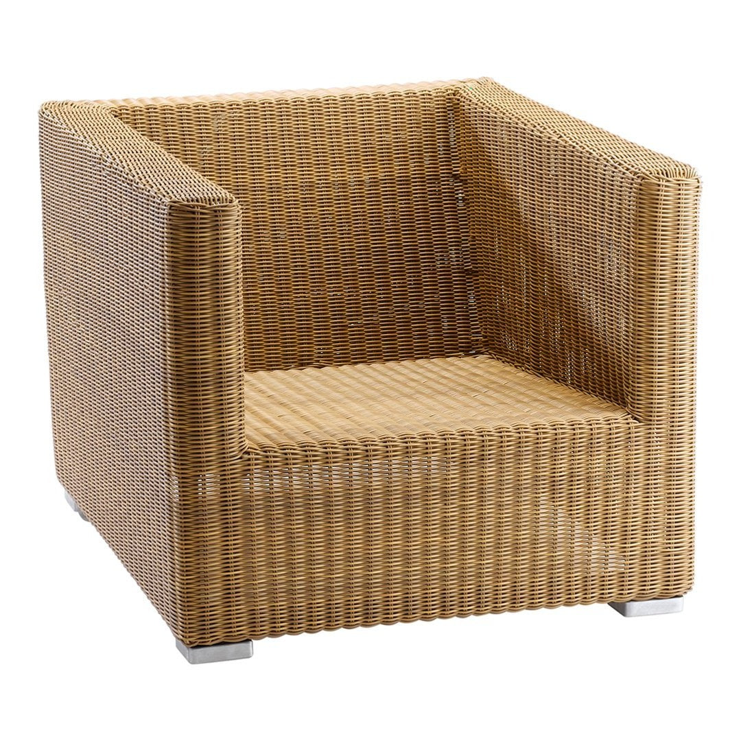 Brown wicker armchair featuring a textured, woven pattern for a natural, stylish look. Perfect for outdoor spaces.