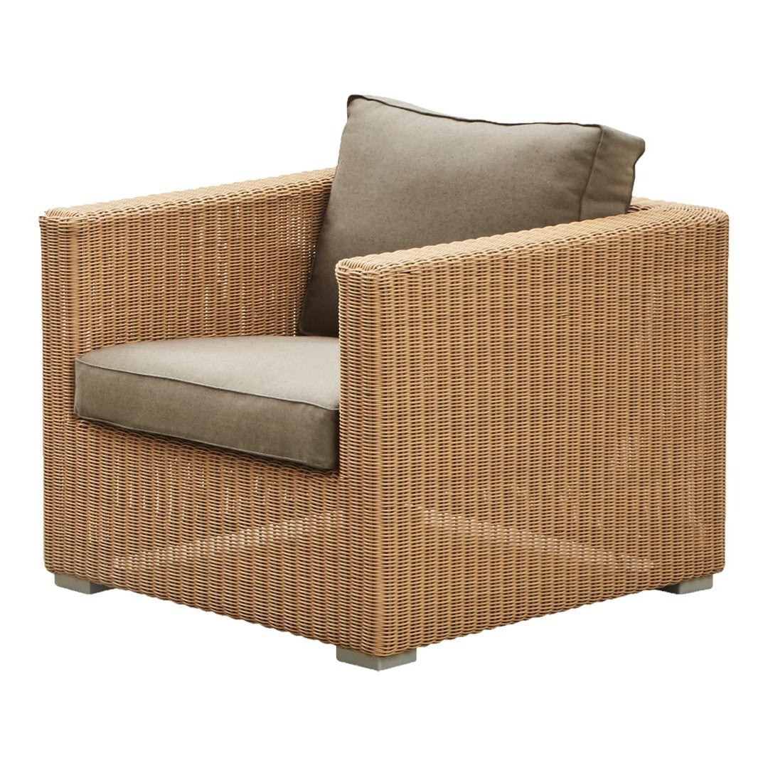 Tan woven texture armchair with a soft beige cushion, perfect for contemporary outdoor or indoor decor.