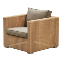 Tan woven texture armchair with a soft beige cushion, perfect for contemporary outdoor or indoor decor.