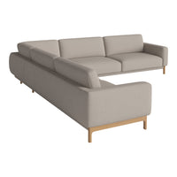 Beige sectional sofa with a simple, modern design and light wood legs. Perfect for contemporary living spaces.