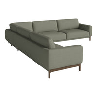 Stylish two-tone sectional sofa in muted green fabric with clean lines and modern brown legs. Ideal for contemporary decor.