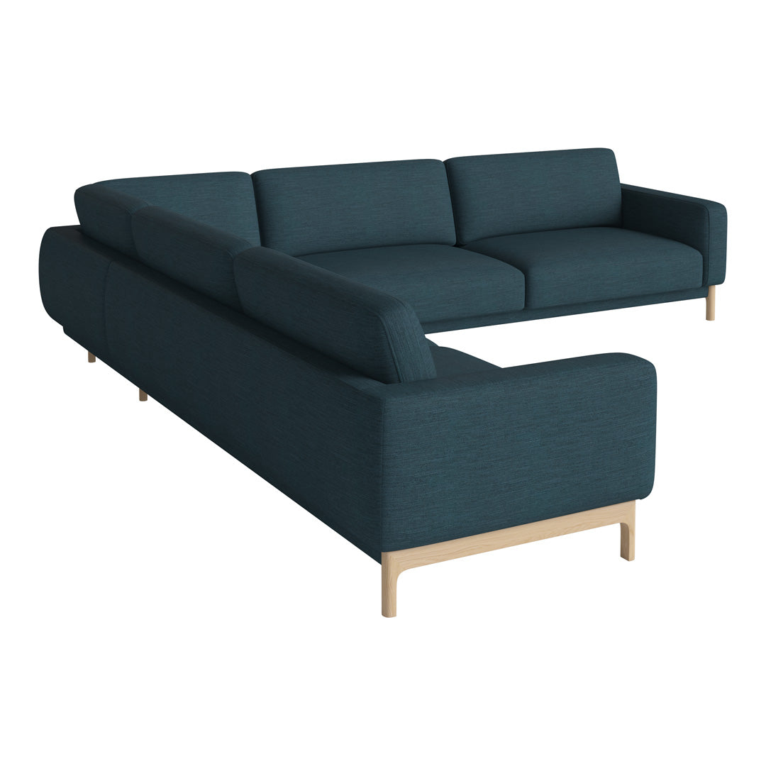 Teal sectional sofa with a textured fabric and natural wood legs, perfect for modern living spaces.