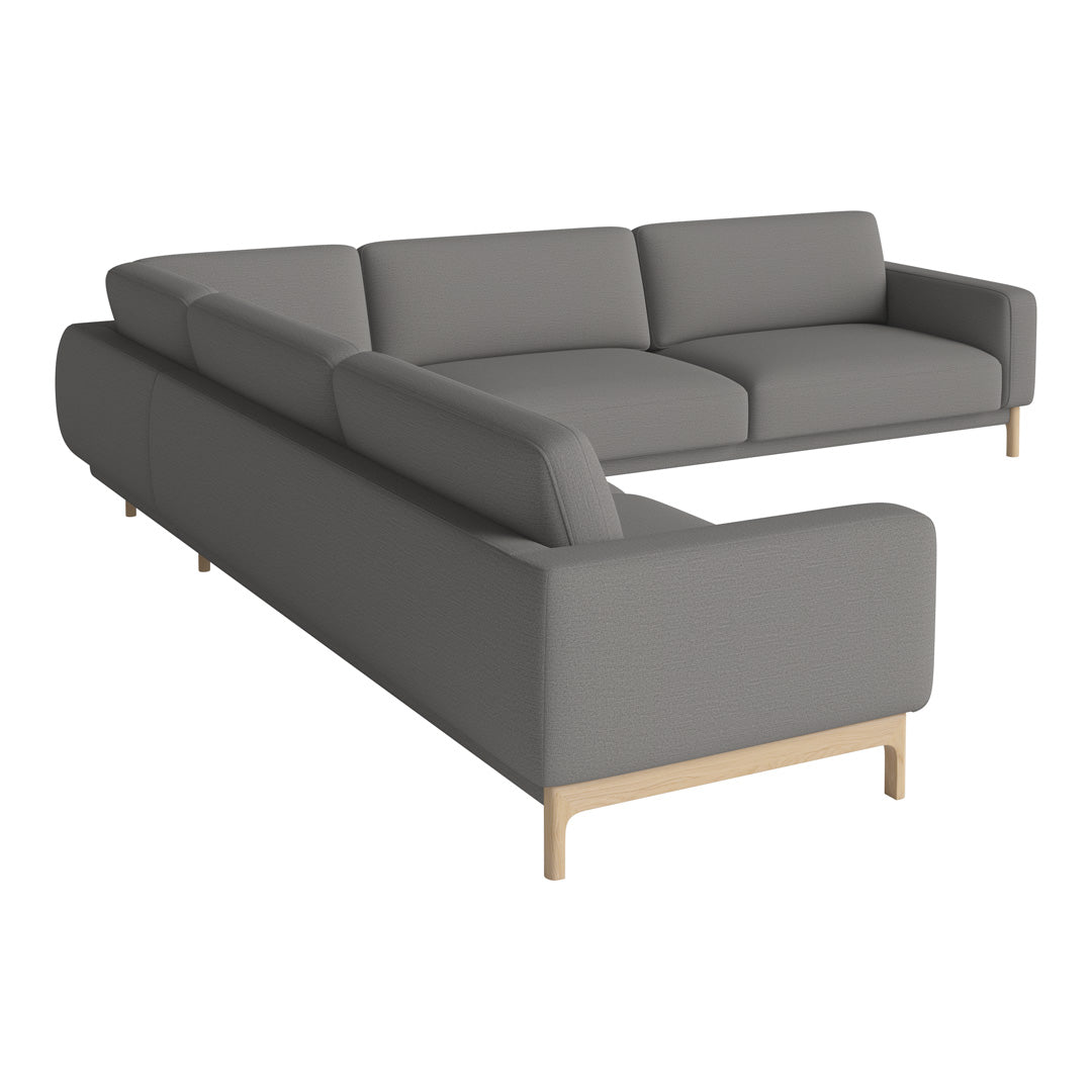 Gray sectional sofa with clean lines and minimalist design, featuring a light wooden base and no visible patterns.