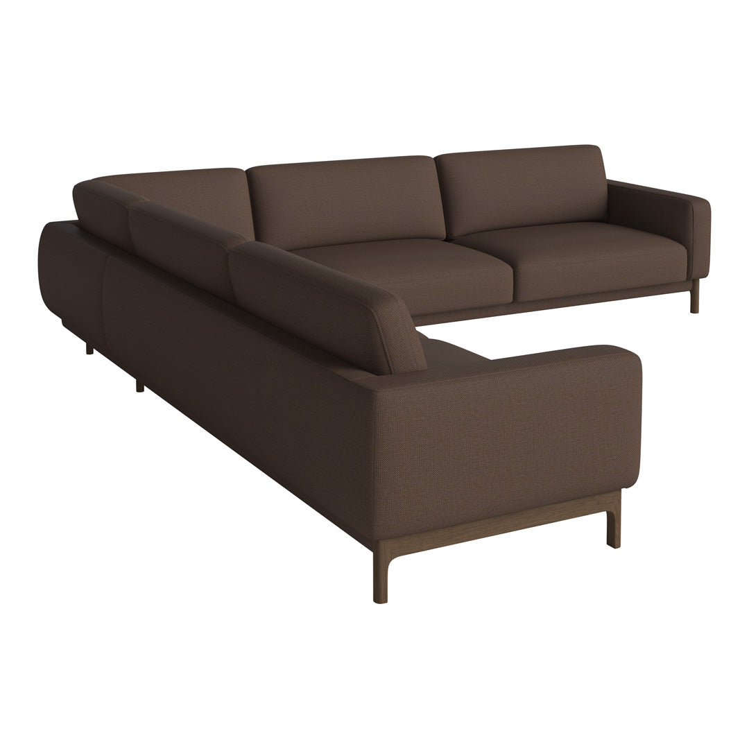 "Modern L-shaped sofa in rich chocolate brown upholstery, featuring a sleek, minimalistic design."