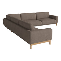 Stylish L-shaped sectional sofa in a warm taupe fabric with a smooth, sleek design and wooden legs.