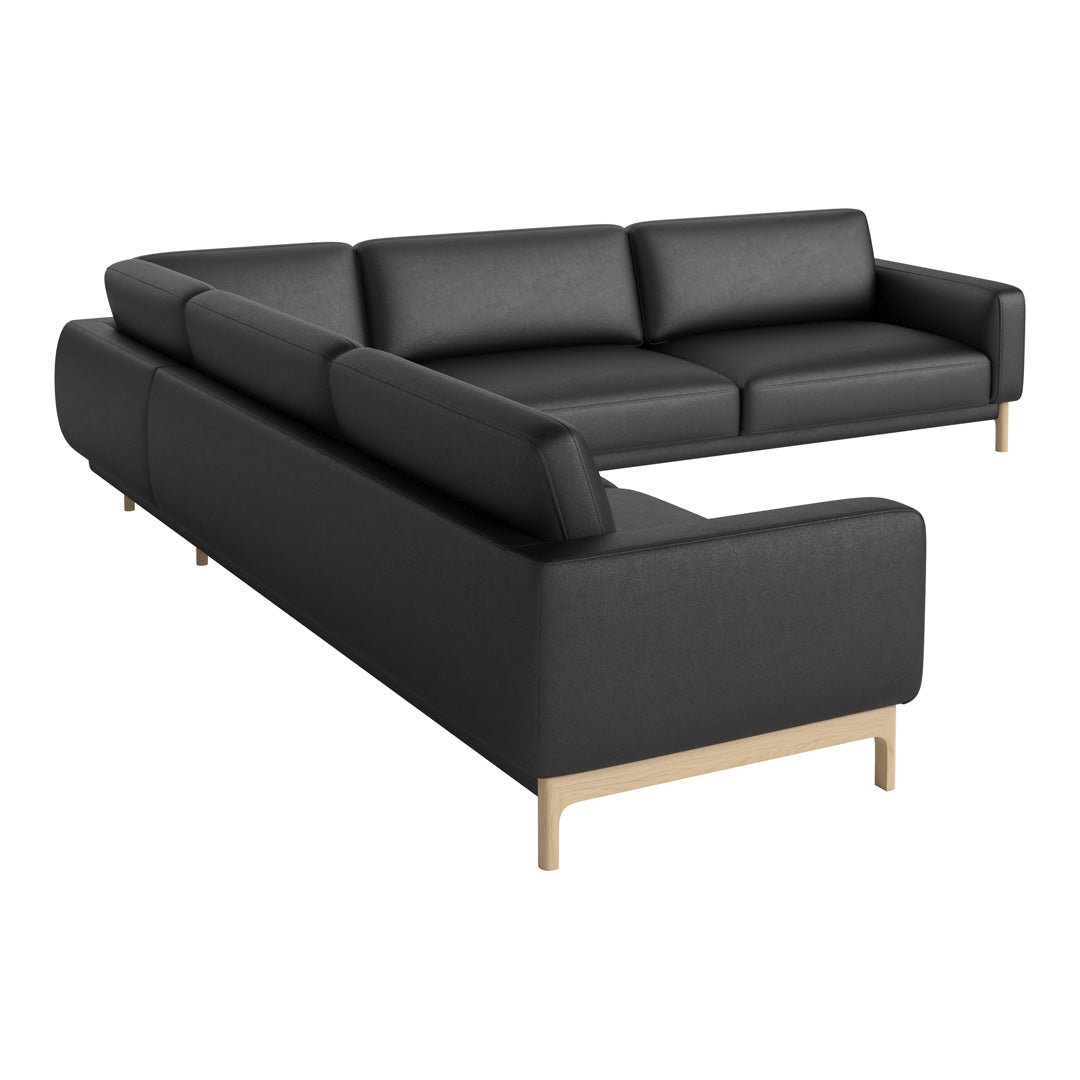 Black fabric sectional sofa with a minimalist design and light wooden legs. Perfect for modern living spaces.