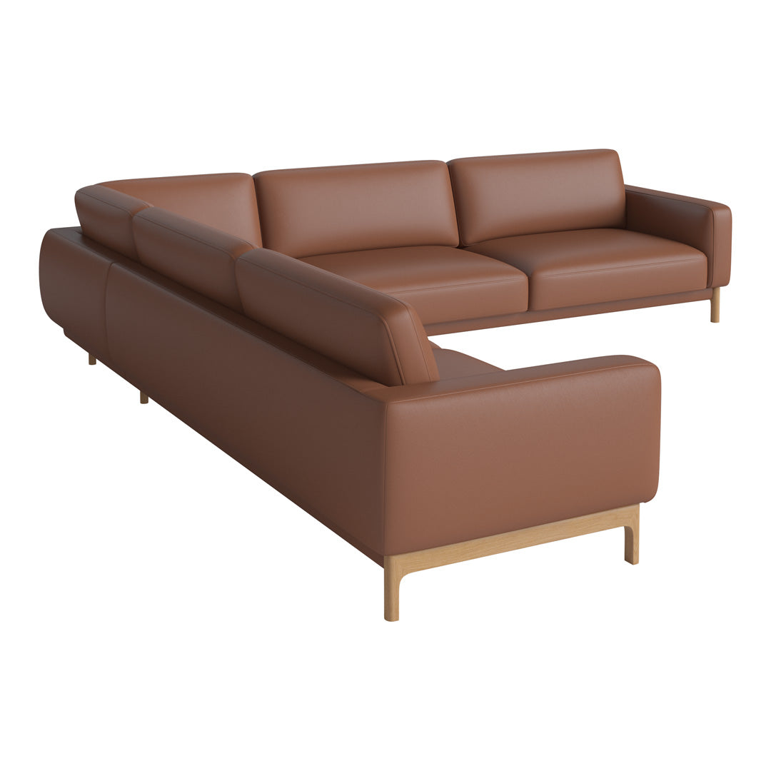 Modern brown leather sectional sofa with smooth surfaces and sleek wooden legs. Perfect for contemporary interiors.