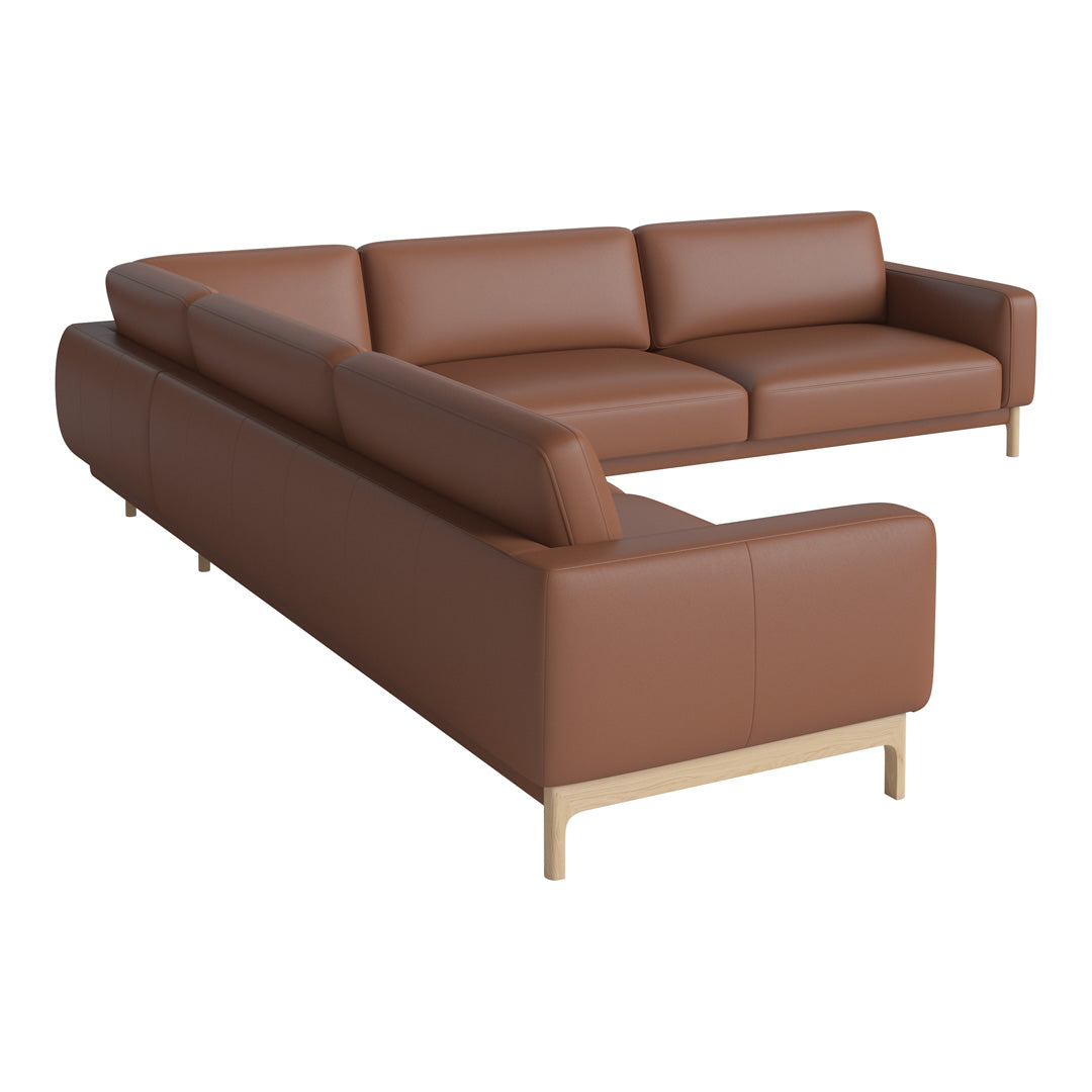 Brown leather sectional sofa with sleek lines and minimalist design, featuring a smooth surface and wooden legs.