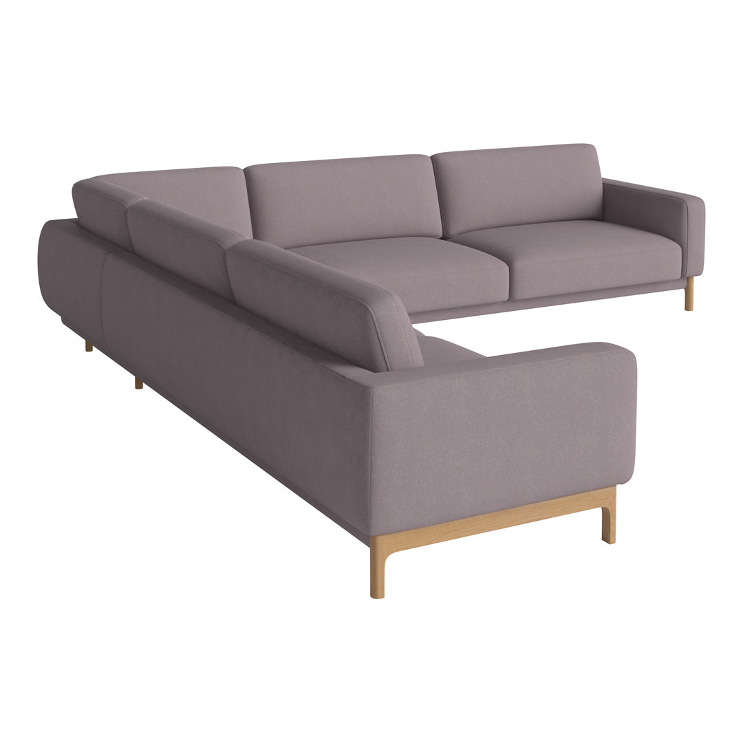 Gray sectional sofa with clean lines and a subtle texture, featuring light wooden legs for a modern touch.