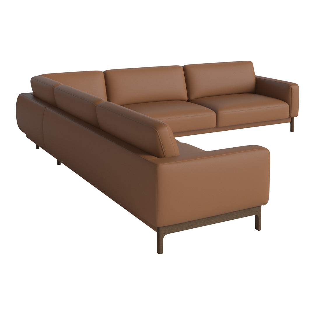 Brown leather sectional sofa with smooth surface and clean lines, featuring a modern design suitable for any living space.
