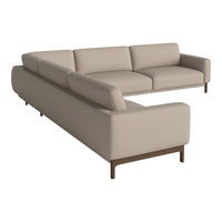 Beige sectional sofa with clean lines and subtle, modern design, featuring a smooth fabric and brown legs.