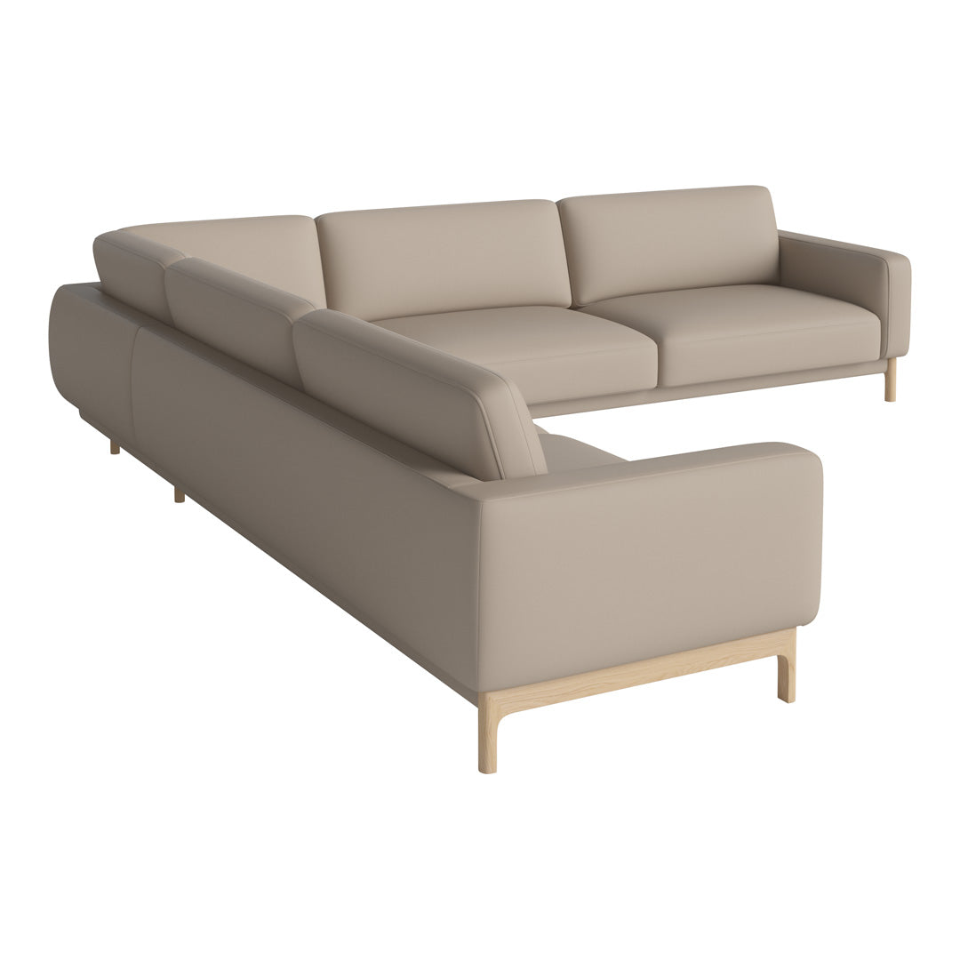 Beige sectional sofa with smooth fabric and light wooden legs, featuring a minimalist design and contemporary style.