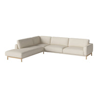 Light beige sectional sofa with a clean, minimalist design and natural wood legs, perfect for modern decor.