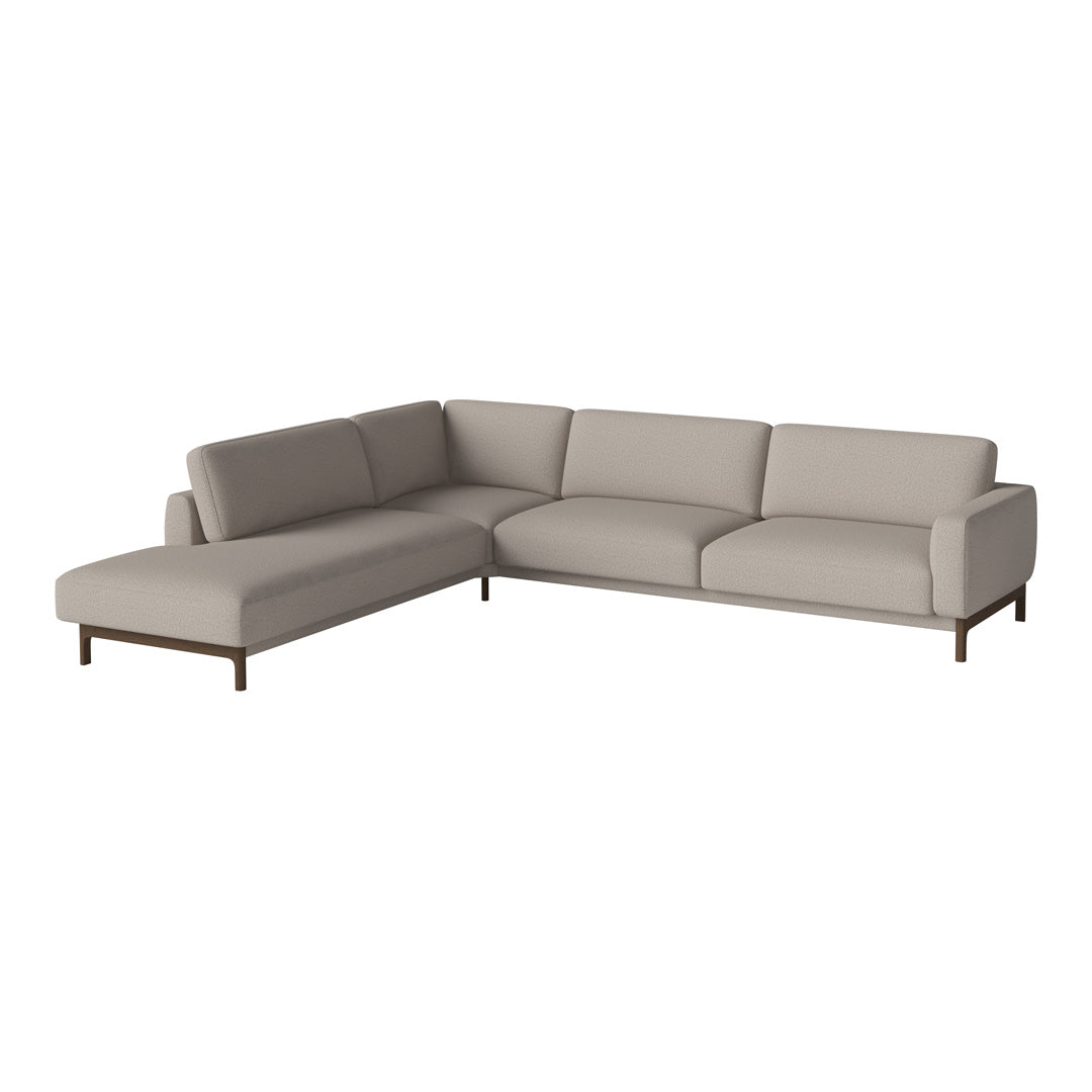 Light grey, modern sectional sofa with clean lines and soft upholstery, featuring a minimalist design and wooden legs.