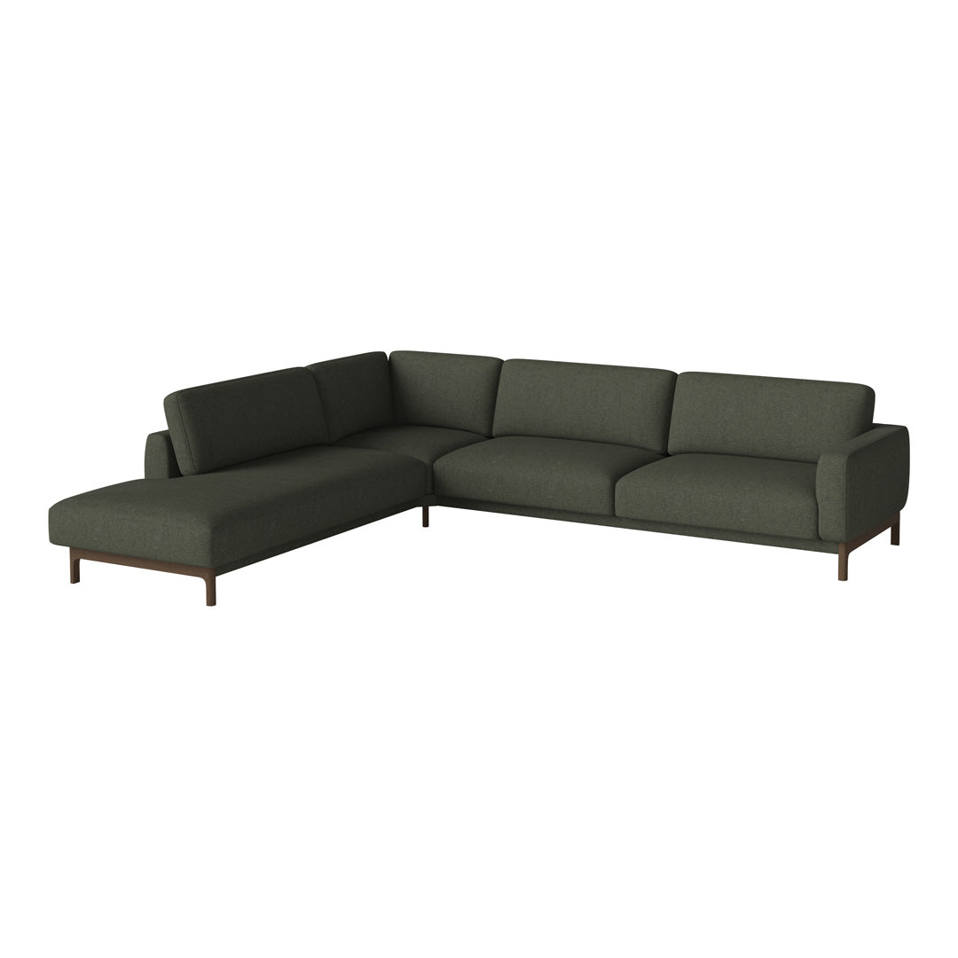 Dark green sectional sofa with a modern design and smooth, minimalist upholstery, perfect for stylish interiors.