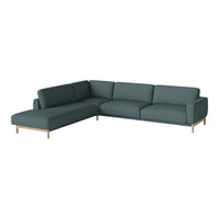 Modern dark green sectional sofa with smooth fabric and light wooden legs, perfect for contemporary living spaces.