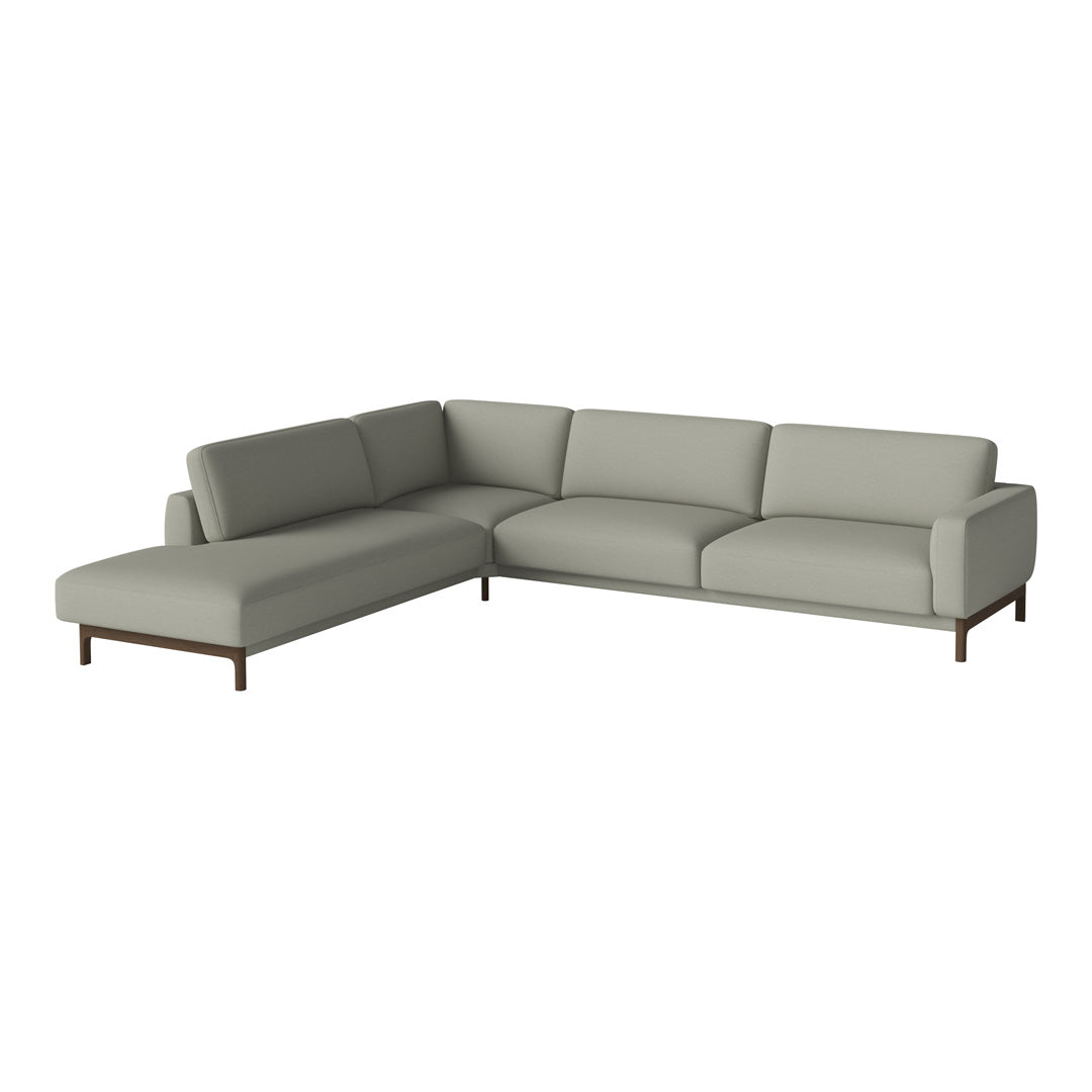 Light gray sectional sofa with a minimalist design, featuring solid wood legs and smooth fabric upholstery.
