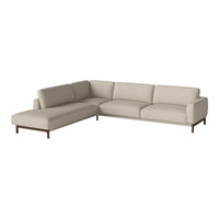 L-shaped sofa in a neutral beige fabric with clean lines and minimalist design. Ideal for modern living spaces.
