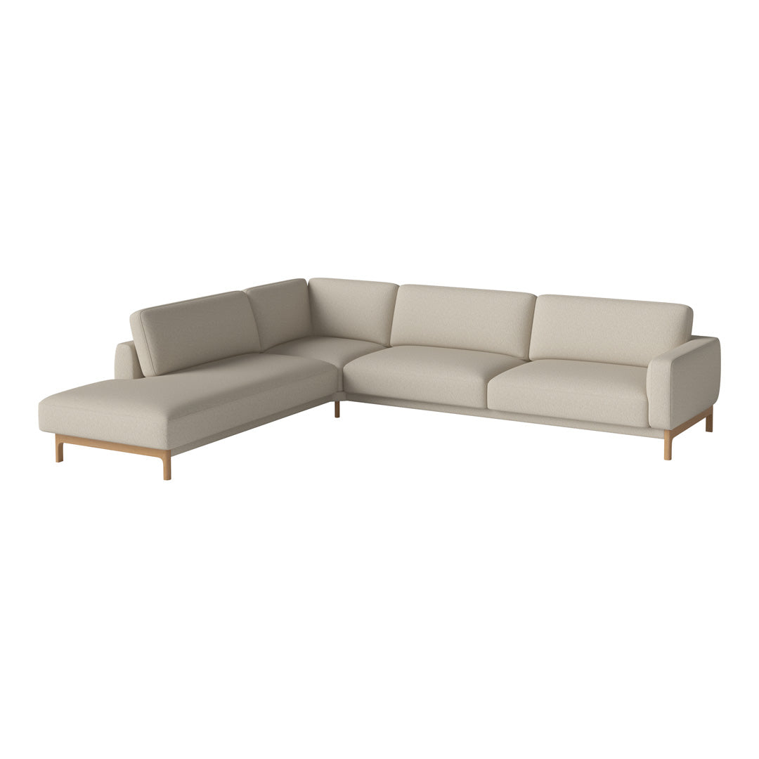 Beige sectional sofa with clean lines and light wooden legs, perfect for modern living spaces.